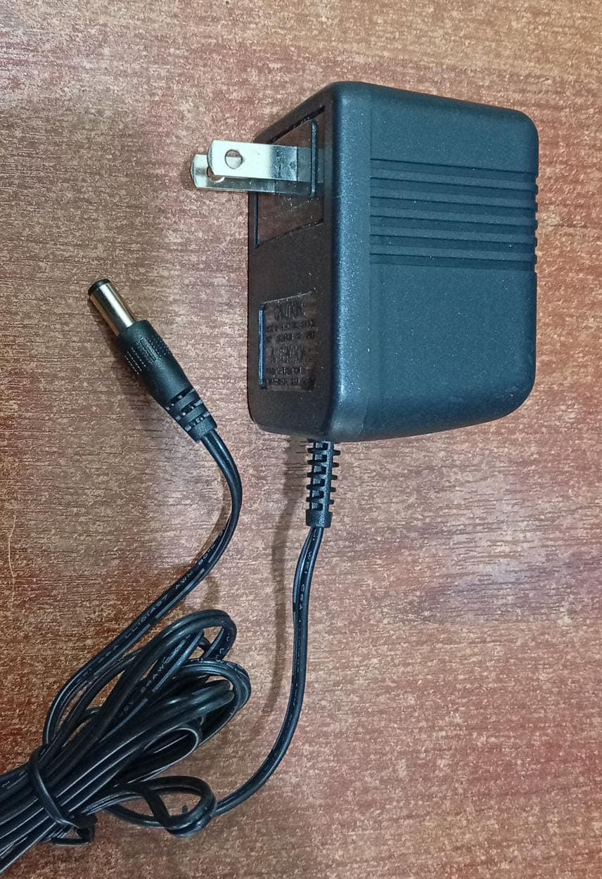 Fuente de alimentación AC‑DC (Adaptador) Wisecomm RGD41150250 15V 250mA – Usado — imagen 3